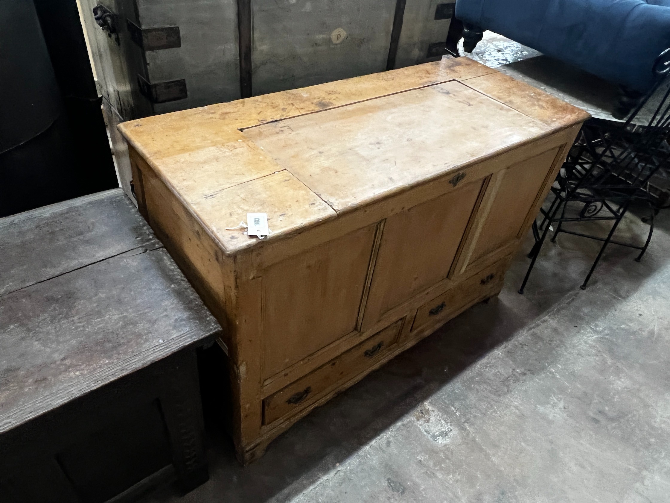 An early 19th century pine mule chest, the hinged top adapted, width 124cm depth 51cm height 80cm